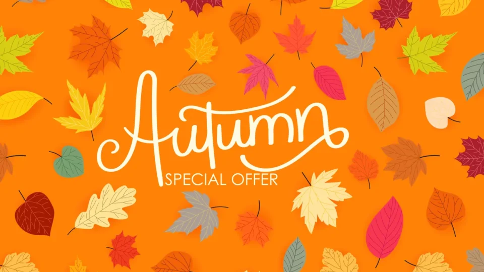 Orange background with scattered colorful autumn leaves and white text in the center reading