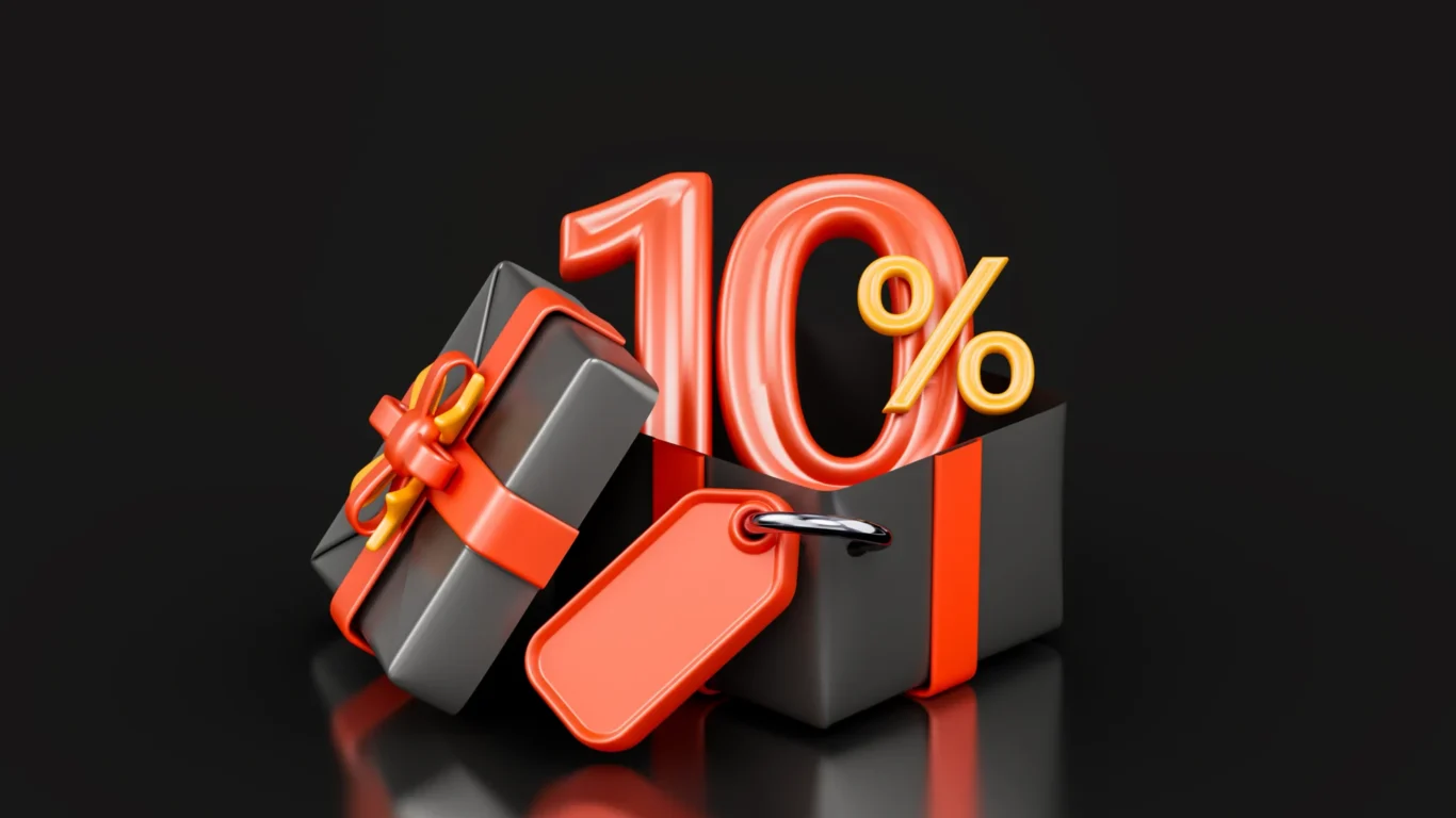 Black gift box with a red ribbon, a red price tag, and large red-orange 